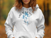White hoodie with Lake Blue Ridge, Georgia map and compass graphic.