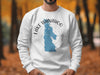 White sweatshirt with blue Lake Wanahoo map and compass graphic.