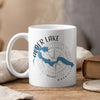 White mug with Alder Lake map, compass, and Washington text.
