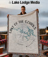 Man holding a blanket with a map of Lake of the Ozarks, Missouri.