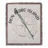 Woven blanket with "DON PEDRO ISLAND FLORIDA" text and compass graphic.