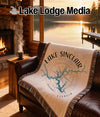 Woven blanket with Lake Sinclair map and compass design, "Georgia" text.