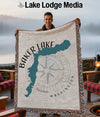 Blanket with Baker Lake, Washington map, compass, and fringe.