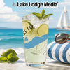 Glass with Lake Erie map, limes, mint, and ice on a beach scene.