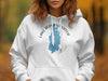 White hoodie with a blue Lake Derwentwater map and compass graphic.