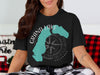 Black t-shirt with "Grand Lake Colorado" text, lake outline, and compass rose graphic.