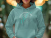 Teal hoodie with Great Sacandaga Lake compass and New York graphic.