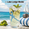 Glass with "Kekama Lake Minnesota" map and compass, with limes, mint, and sunglasses.