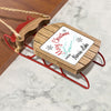 Wooden sled ornament with "Merry Christmas from Norris Lake" text.