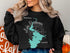 Black sweatshirt with "Beautiful Lake Buchanan Texas" map and compass design.