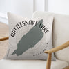 Pillow with Rattlesnake Lake Washington map and compass design.