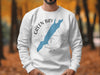 White crewneck sweatshirt on a man with Green Bay Wisconsin map and compass graphic.