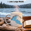 White mug with "Clearwater Lake Minnesota" design, steaming hot.