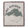 Woven throw blanket with Lake Superior map, compass rose, and text.