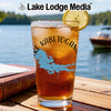 Glass of iced tea with a lemon slice, featuring Kabetogama map and compass design.