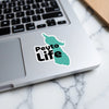Peyto Life sticker on a laptop keyboard.