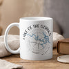White mug with Lake of the Ozarks compass and Missouri text.