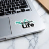 Saguaro Life sticker featuring a teal outline of Arizona over black bold text.