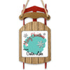 Wooden ornament shaped like a sled with "Merry Christmas From Crater Lake" text.