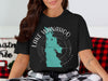 Black t-shirt with teal outline of Nebraska and "Lake Wahoo Nebraska" text.