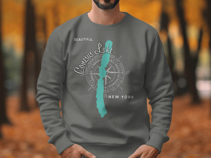 Gray sweatshirt with "Beautiful Conesus Lake, New York" text and compass design.