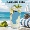 Glass of iced drink with lime and mint, Spaz Lake graphic, on a beach.