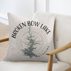 Pillow with "Broken Bow Lake Oklahoma" and compass design.