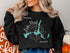 Black sweatshirt with "Lake Mead Beautiful Compass Arizona" graphic.