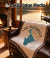 Tapestry throw with Lake Buchanan map, compass, and "Texas" text.