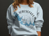 Light blue sweatshirt with "Lake Tobesofkee Georgia" and a lake map over a compass.