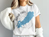 White t-shirt with blue Sand Lake map and compass graphic, says Sand Lake Ontario.