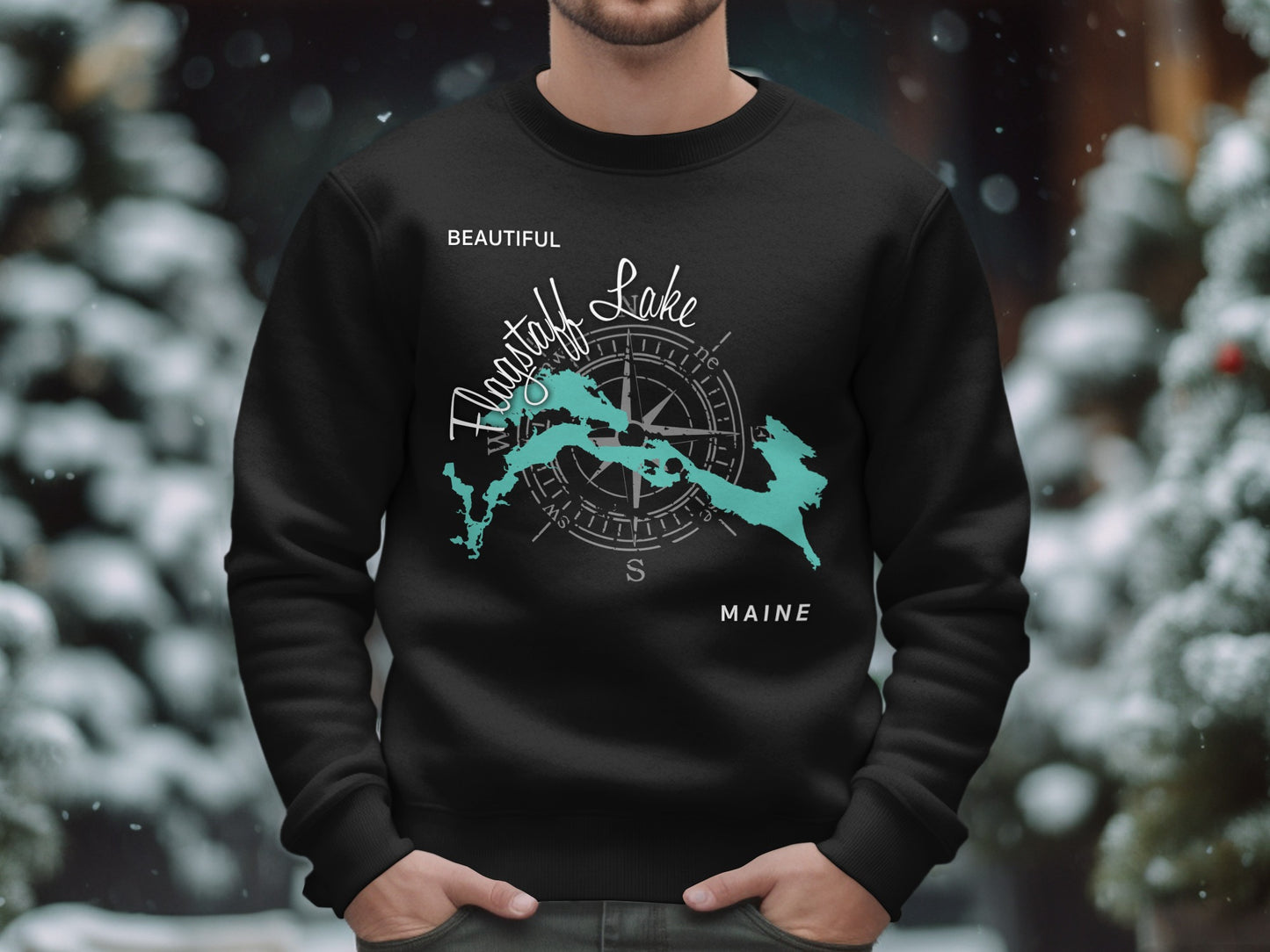 Black sweatshirt with teal map of Moosehead Lake and compass design, "Maine".