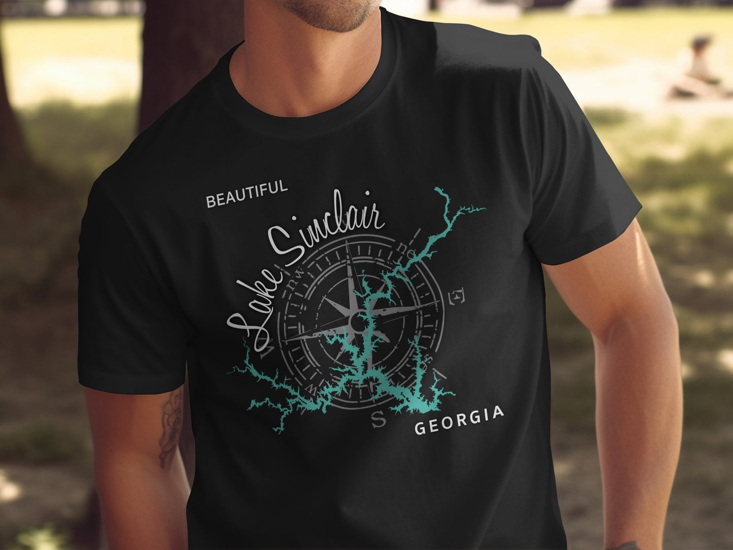 Black t-shirt with "Lake Sinclair GEORGIA" and compass design.