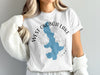 White t-shirt with blue West Okoboji Lake map and compass design.
