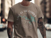 Light tan t-shirt with "Lake of the Ozarks Missouri" text and compass graphic.