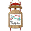 Wooden sled ornament with "Merry Christmas From Flagstaff Lake" text and map outline.