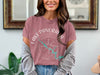 Dusty rose t-shirt with white "Lake Panorama" text and teal map graphic.