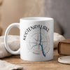 White mug with Kootenay Lake map and compass graphic, "CANADA" text.