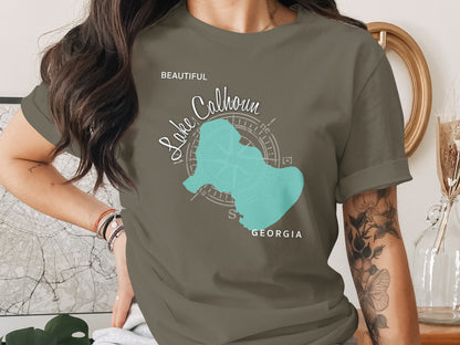 T-shirt with lake outline and compass, "Beautiful Lake Calhoun Georgia" text.