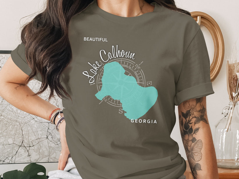 T-shirt with lake outline and compass, "Beautiful Lake Calhoun Georgia" text.
