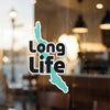 Sticker with turquoise lake shape and "Long Life" text on glass.