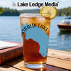 Glass of iced tea with a lemon slice, showing a blue map outline with text.
