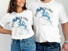Two people wear white t-shirts with an Evergreen Lake, Illinois graphic design.
