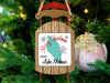 Sled ornament with "Merry Christmas from Lake Mohave" text and snowflakes.