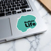Turquoise sticker reads "Buffalo Life" on a laptop.