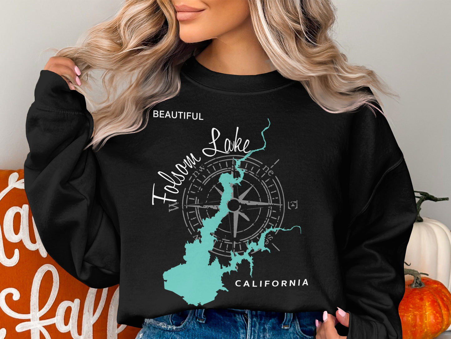 Black sweatshirt with Folsom Lake California map and compass graphic.