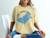 Light yellow t-shirt with Lake Mascupic New Hampshire map and compass design.