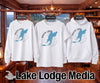 White sweatshirt, t-shirt, and hoodie with Snow Lake Washington map graphic.