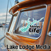 "Lanier Life" sticker on a boat window, with "Lake Lodge Media" logo below.