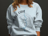 Light blue sweatshirt with Lake Oahe and compass design, North Dakota